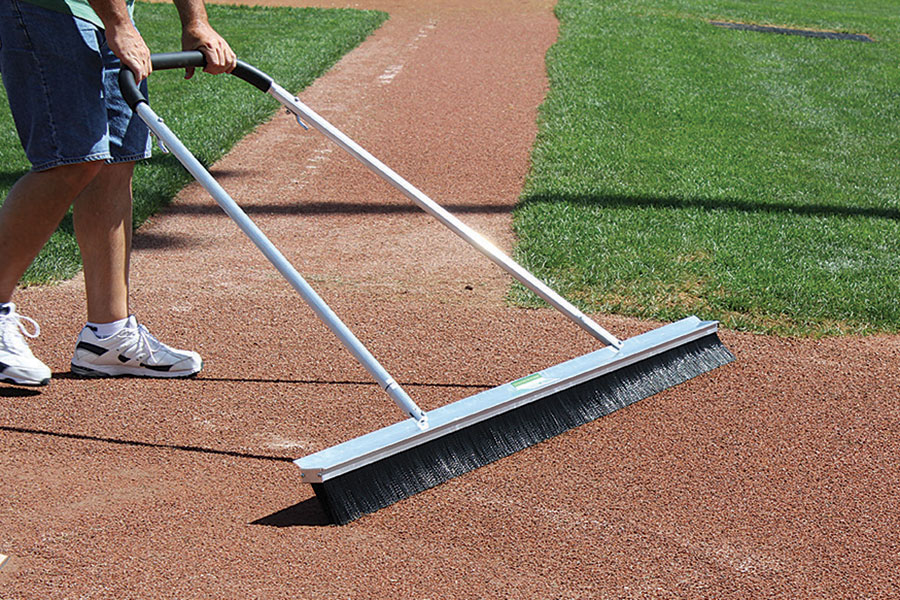 Get a broomed infield finish from the 7'W leveling blade on one side
