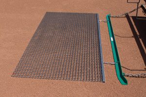 Steel mat drag shown with leveling bar