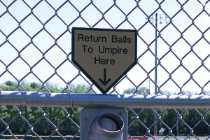 "Return Balls to Umpire Here"