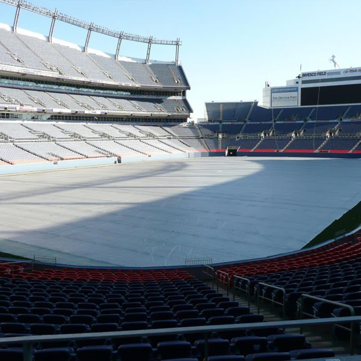 Large winter blanket tarp covering a field